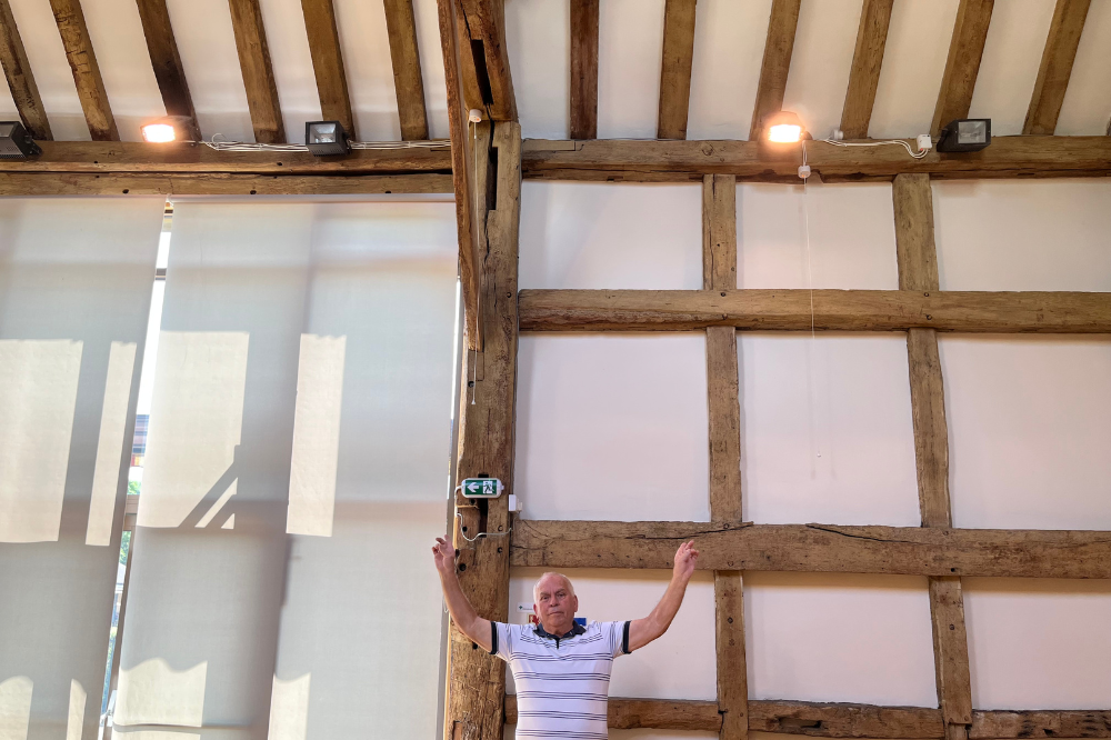 An image showing an applicant pointing to where LED replacement lights will be going. 
