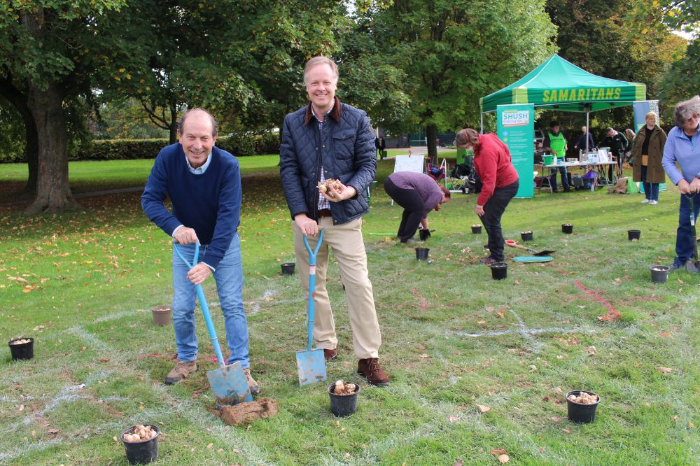 HDC councillors Roger Noel and Christian Mitchell pitch in with the planting
