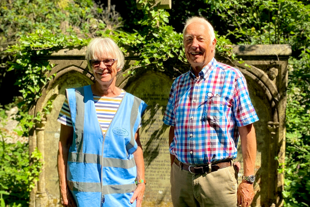 Cllr Skipp with heritage walk leader Vee Willis at the Hurst family tomb.