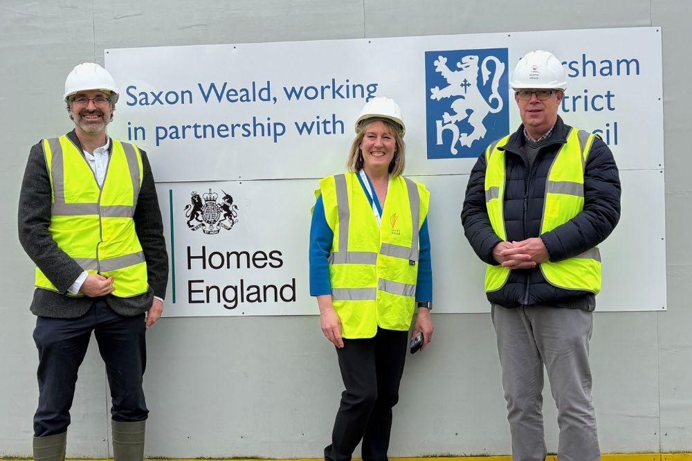 Horsham District Council Cabinet Member for Housing and Communities Cllr Sam Raby with Saxon Weald Chief Executive Corinna Bishopp and the Council's Head of Housing and Communities Andrew Smith at the development site in Cowfold.