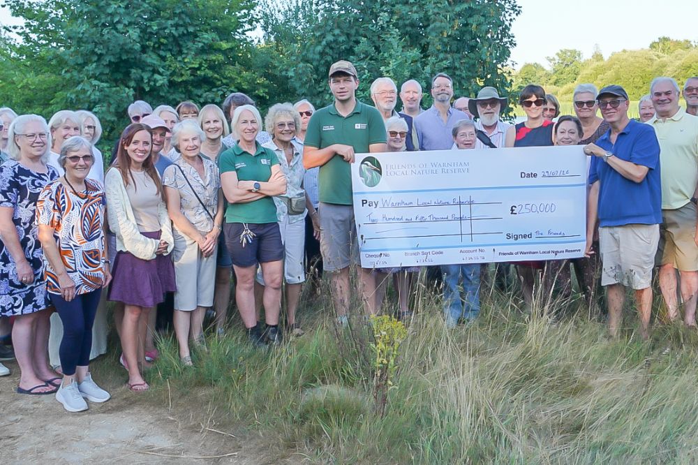 Friends of Warnham Local Nature Reserve with volunteers and members of Horsham District Council's Parks and Countryside team