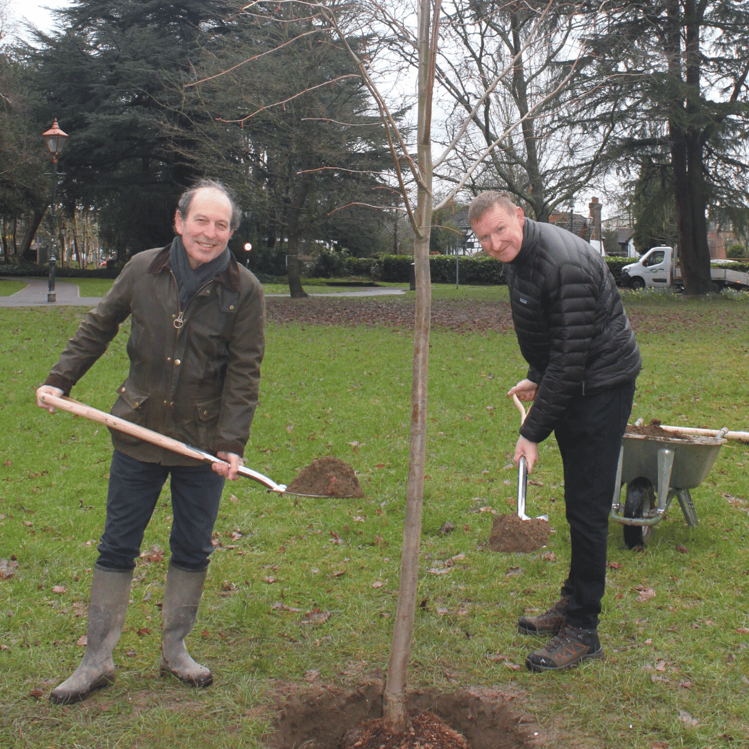 Cllrs Noel and Hogben plant the commemorative tree
