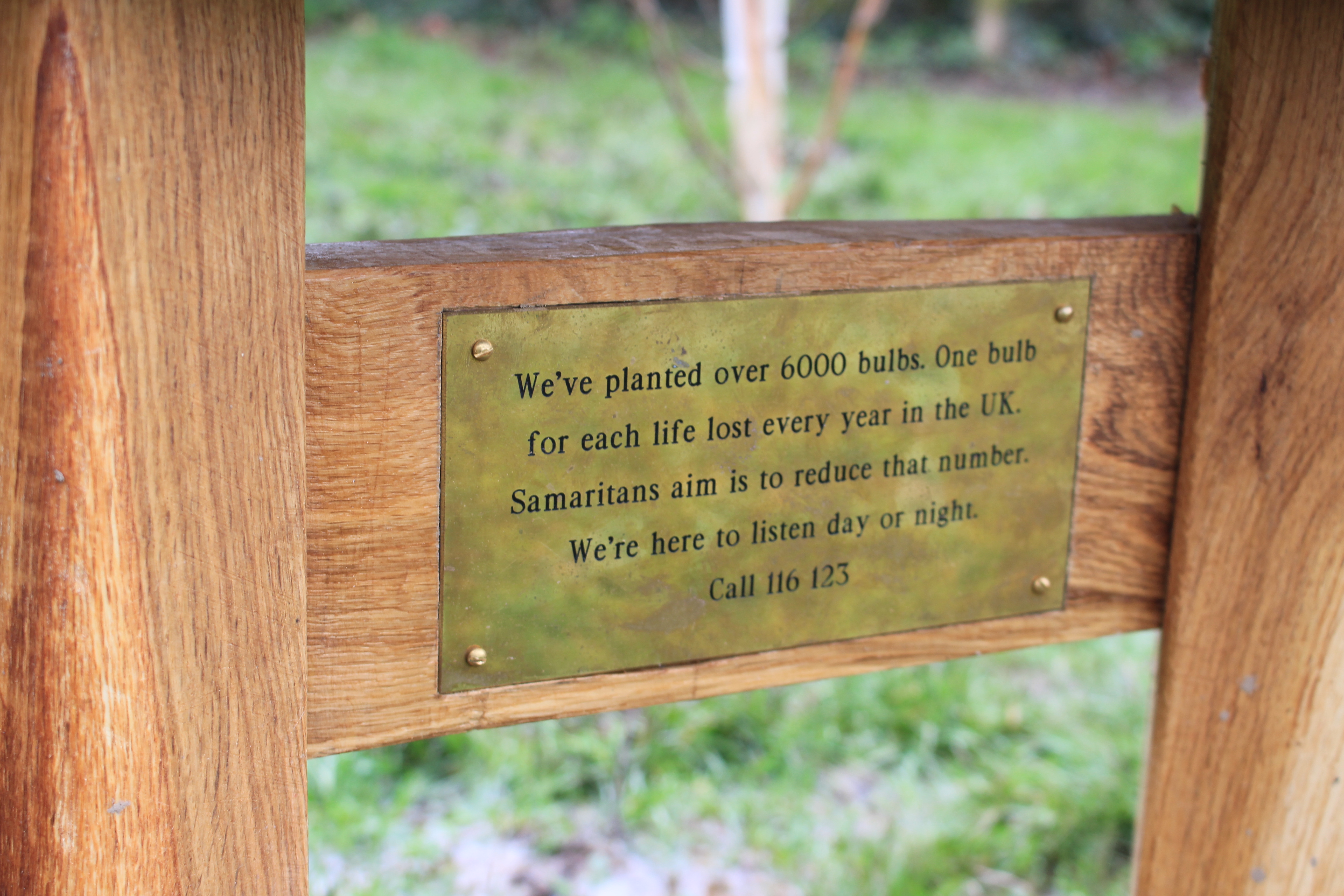 The bench plaque says
