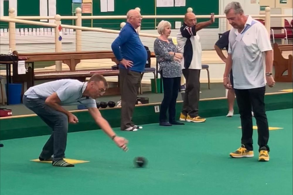 Gary plays indoor bowls 
