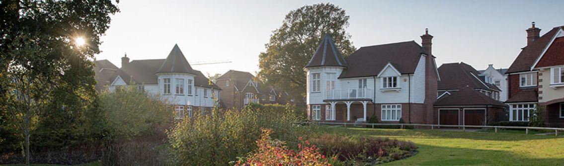 New large houses by Sussex Building Control. The detached homes each have a turret and garden landscaping.