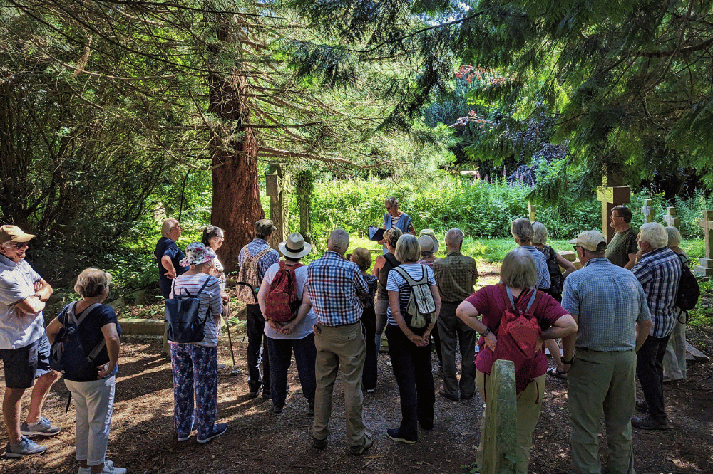 Horsham Society guided walk group in Denne Cemetery.