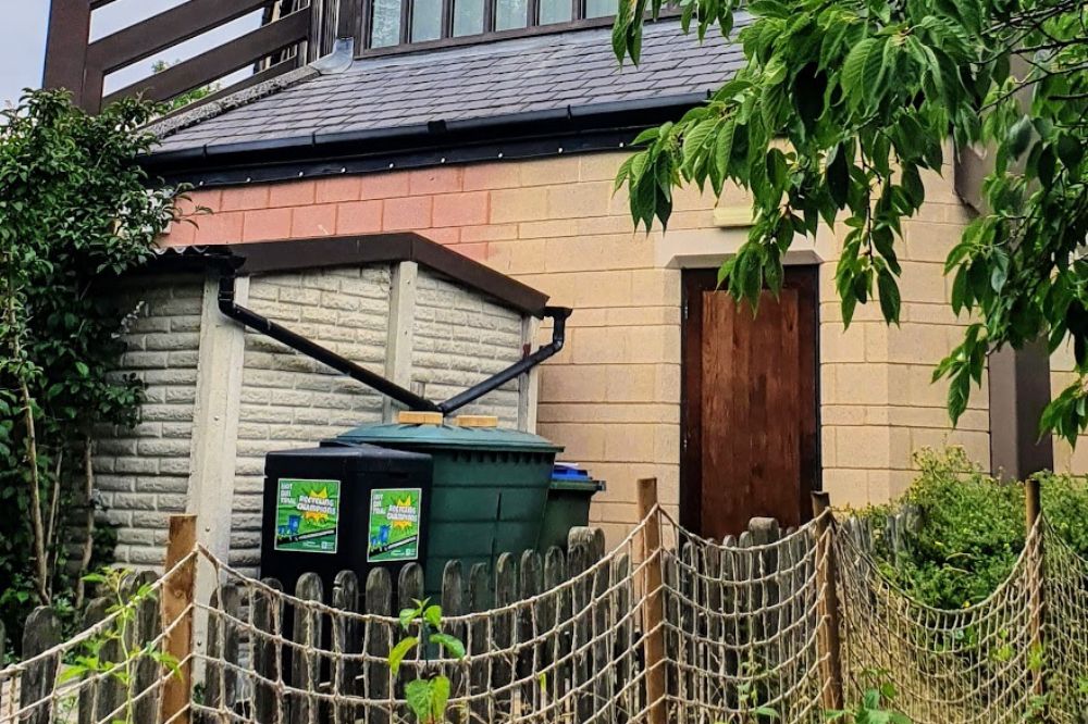 The renovated church garden of St Mark's shows tree planting and hot bin composter