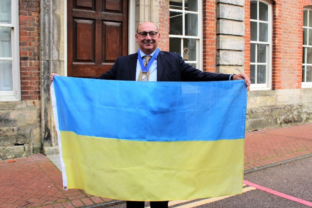 Horsham District Council Vice Chairman Cllr Nigel Emery set to raise the Ukrainian flag