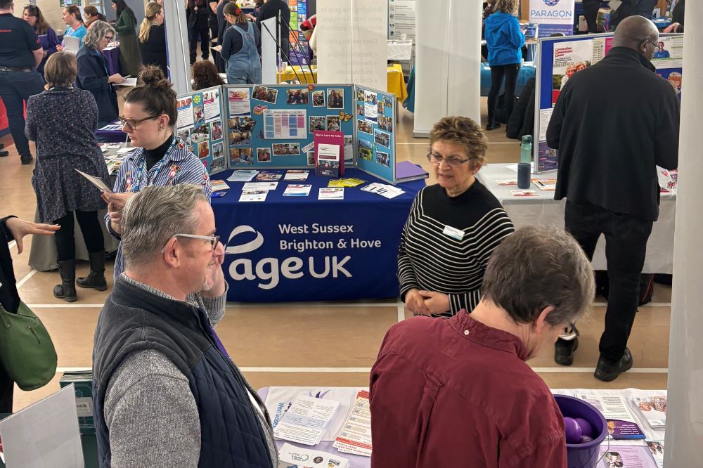 Packed hall at the 2026 Community Marketplace event