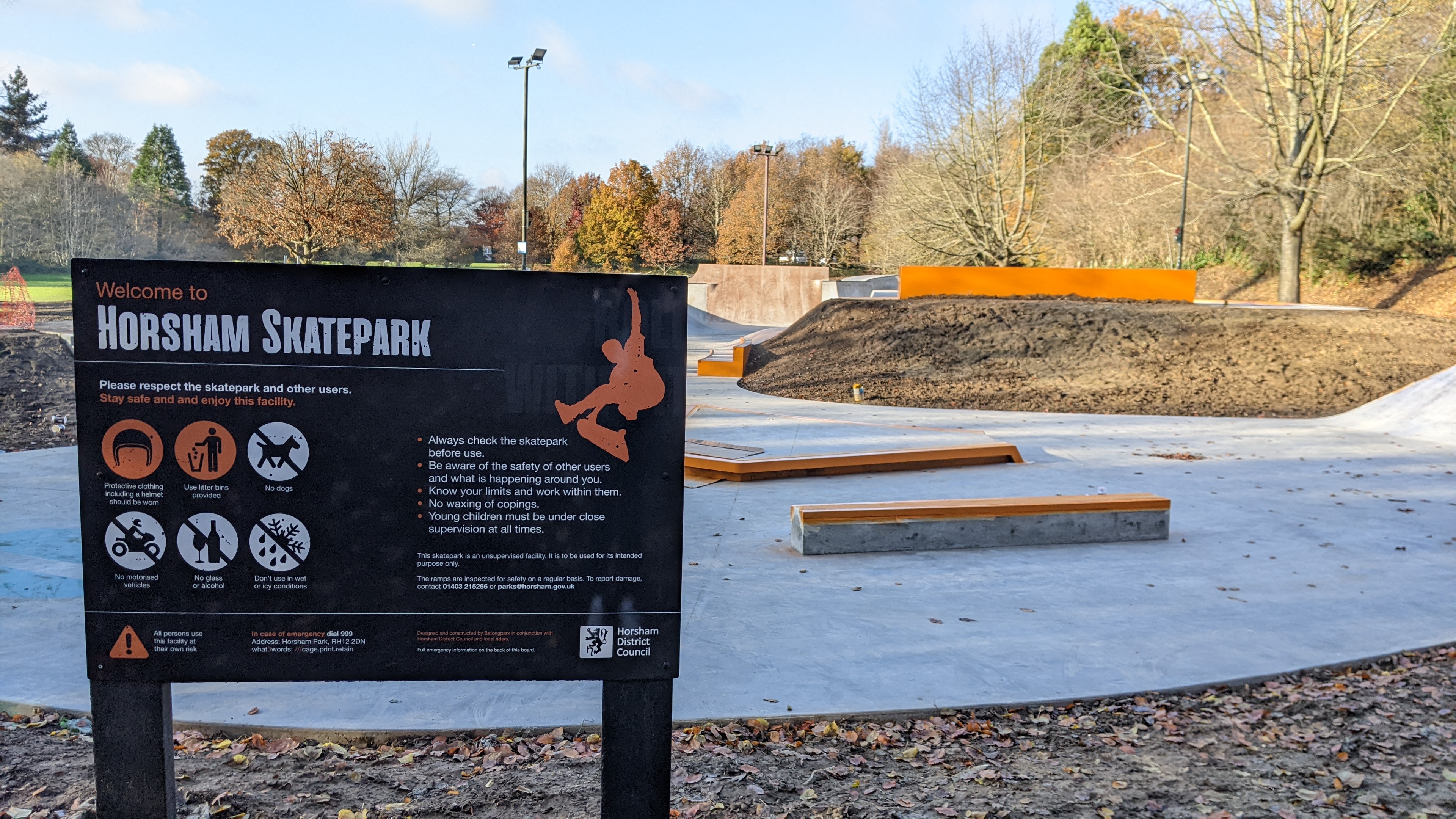 Horsham skate park sign with the concrete park behind it
