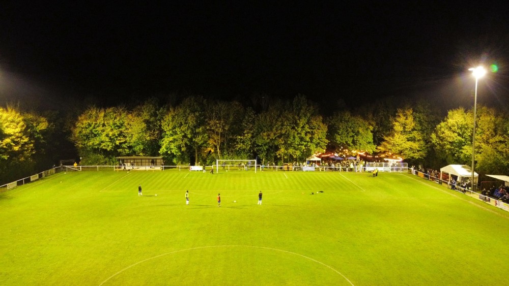 Roffey football pitch with floodlights on.