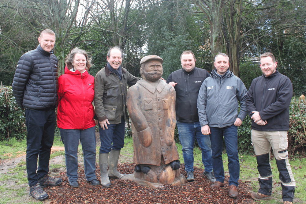 Cllr Roger Noel, Parks and Countryside staff an idverde contractors posing next to the new shepard