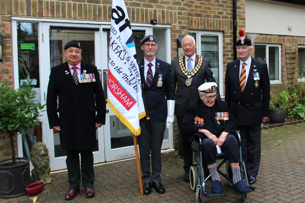 HDC Chairman Cllr David Skipp presenting the new Standard to Crawley & Horsham Armed Forces & Veterans Breakfast Club