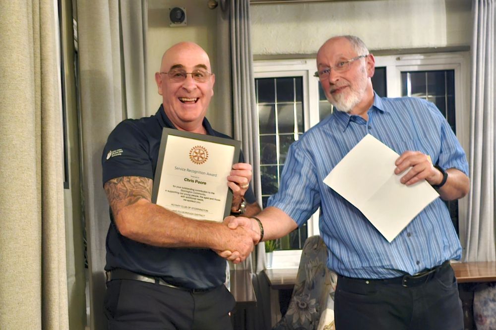 Chris receiving his award from Mark Foss, President of the Rotary Club of Storrington and Pulborough District