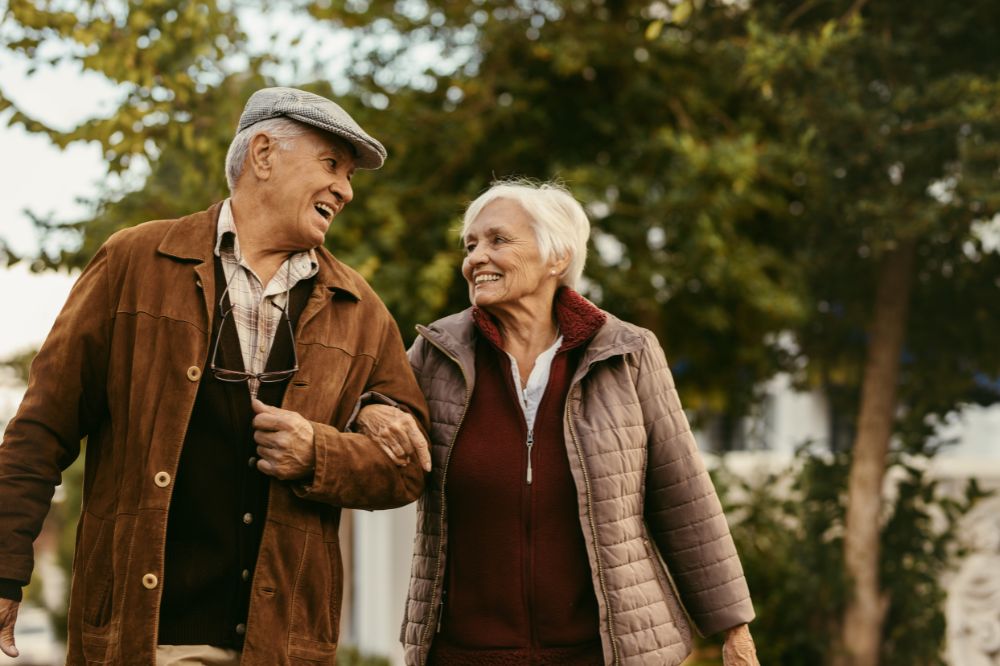 A couple walking on a sunny autumn day