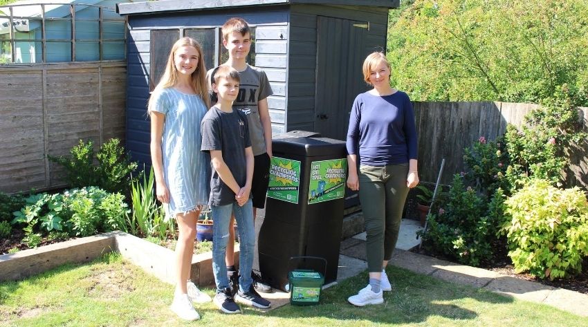 Recycling champion Amanda and family with their Hot Bin and caddy