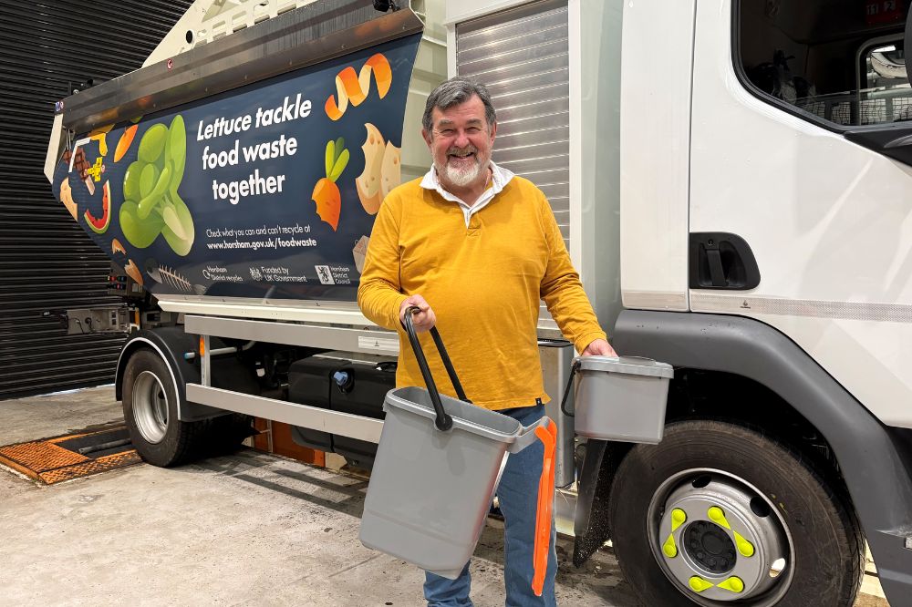 HDC Cabinet Member for Environmental Health, Recycling and Waste Cllr Jay Mercer with new food waste collection truck and bins