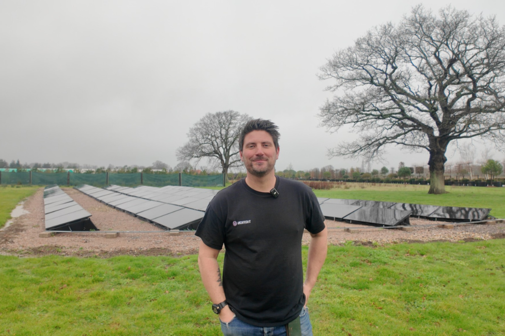 Image of Guy Watts from Architectural Plants in front of solar array