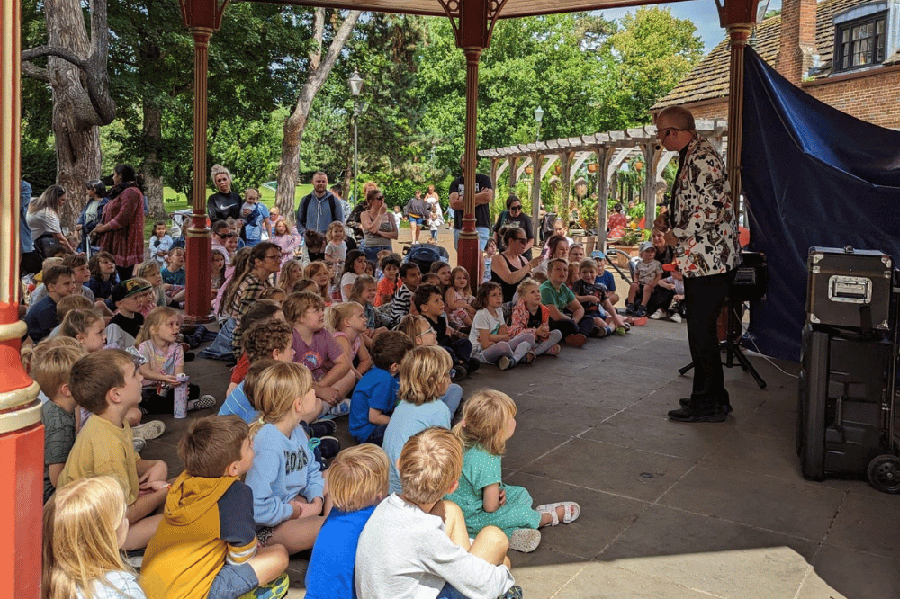 Packed out children's fun session on Horsham Park Podium