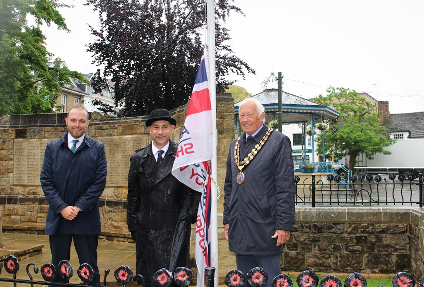 Cllr Billy Greening, RBLs Zal Rustom and HDC Chairman Cllr David Skipp raising the flag