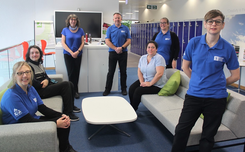 Our Community Link team have blue polo shirts with the Community Link logo