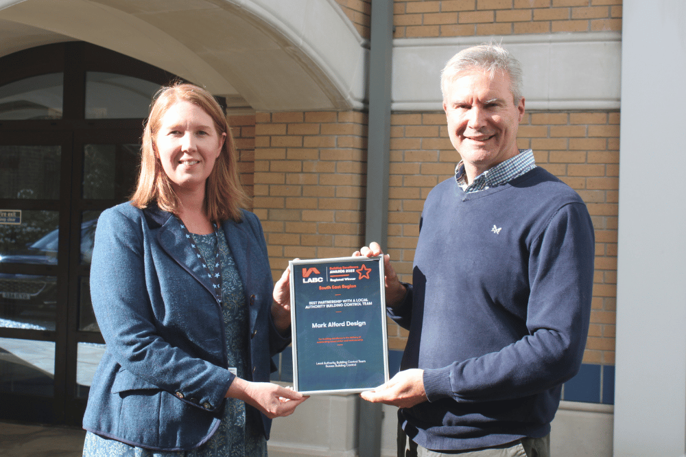 Mark Alford being presented with his award: Best Partnership with a Local Authority Team