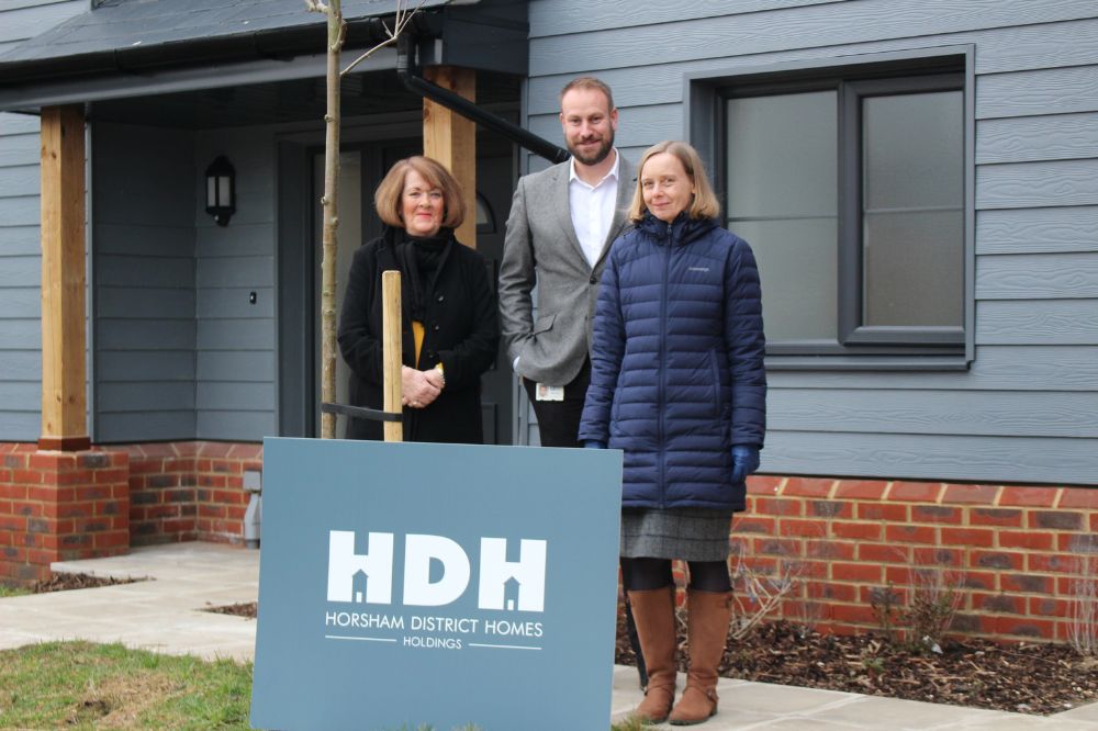 HDC Cabinet Member for Housing and Public Protection Cllr Tricia Youtan , HDC Head of Community Services Rob Jarvis and HDC Chief Executive Jane Eaton at one of the new family homes
