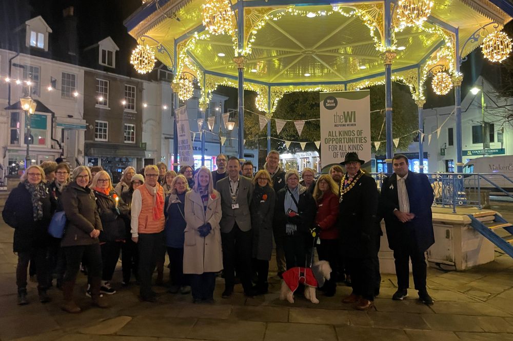 Horsham District councillors with members of the West Sussex Women's Institute and Police and Crime Commissioner Katy Bourne at the White Ribbon vigil in Horsham's Carfax