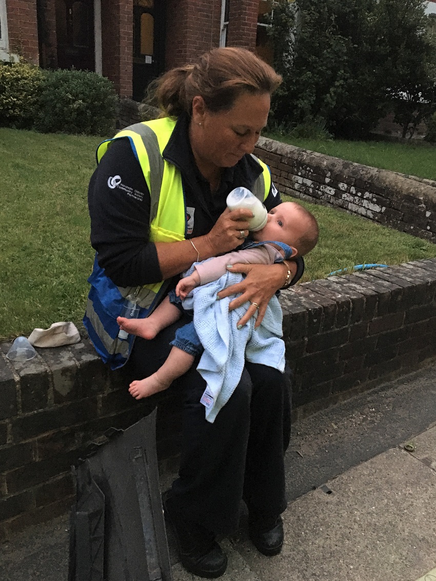 Neighbourhood Warden Vanessa Green with the baby.