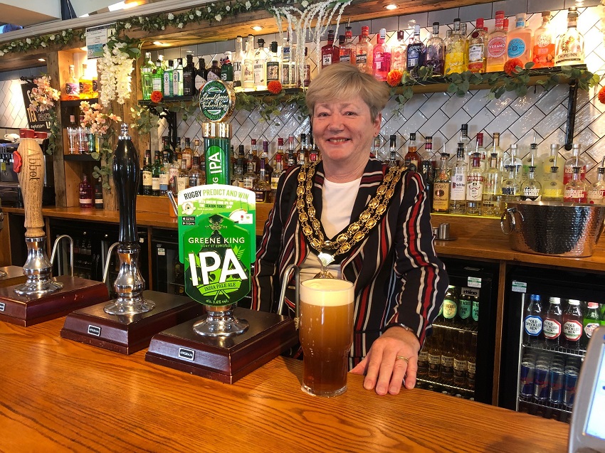 Chairman Cllr Karen Burgess pulls a pint at the Sussex Barn pub in north Horsham