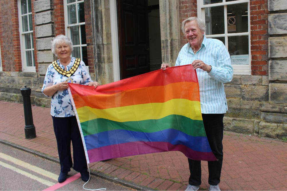 Cllr Kate Rowbottom and Cllr Liz Kitchen set to raise the Gay Pride flag