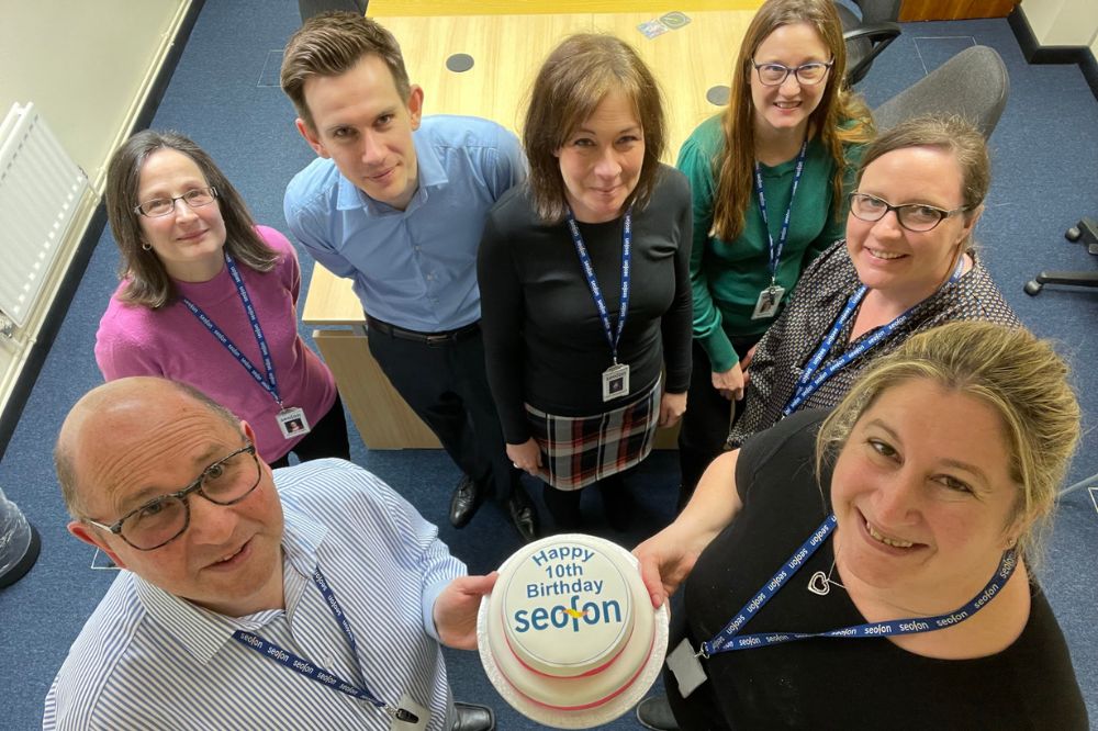 The Seofon team with a 10th birthday cake