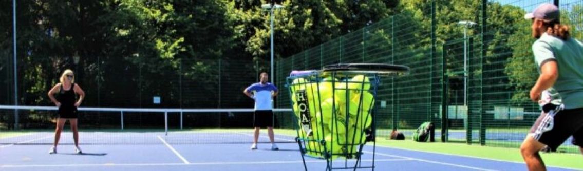 Man and woman on a tennis court