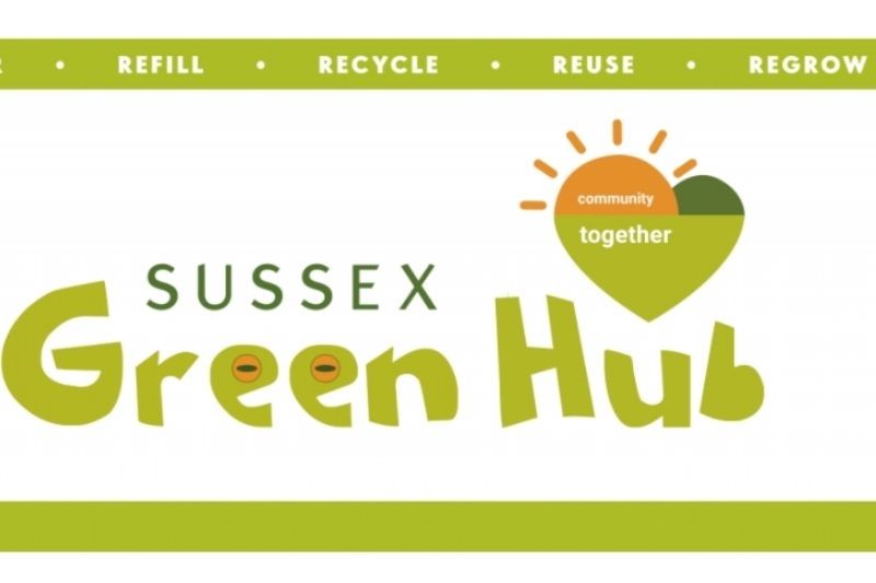 Sussex Green Hub. The logo is a green heart with a sunburst and the words Community Together