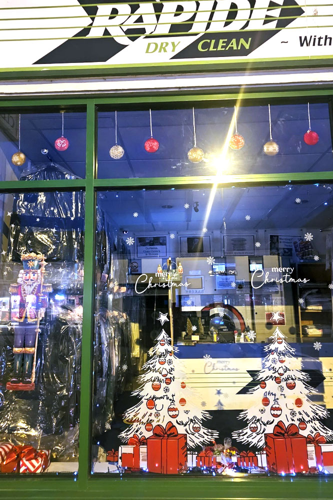 Rapide Dry Cleaners window display