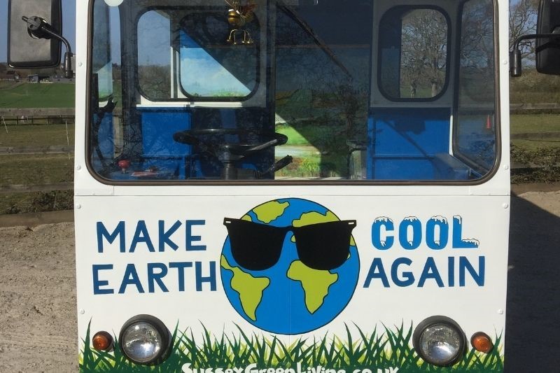 The Eco Station is an old fashioned milk float with Make Earth Cool Again on the front