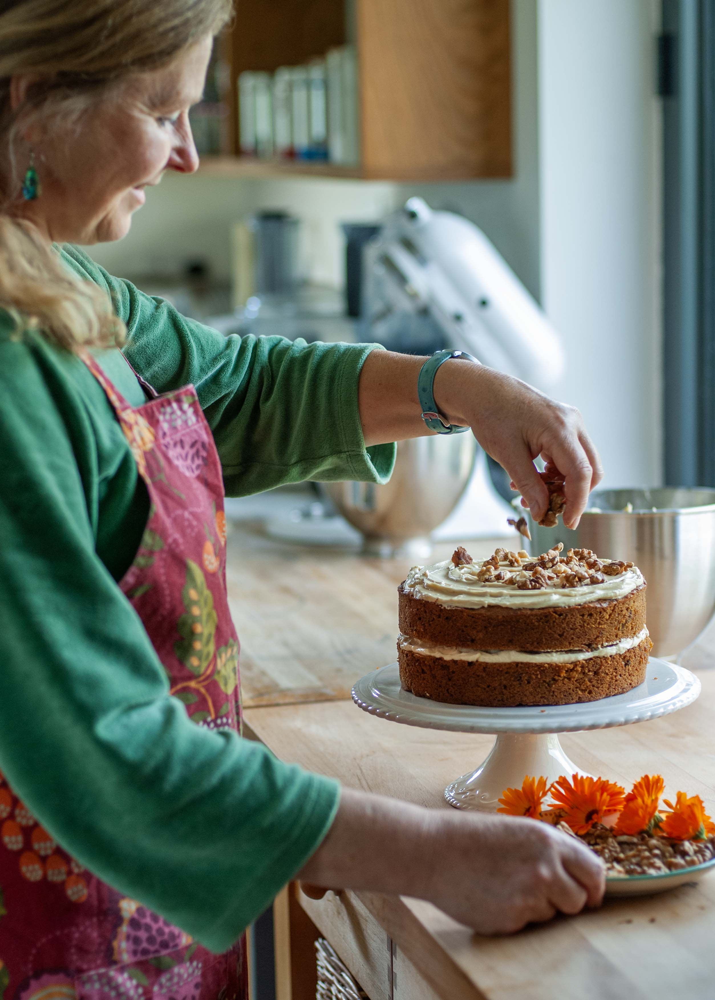 Phillippa Vine decorating pumpkin cake
